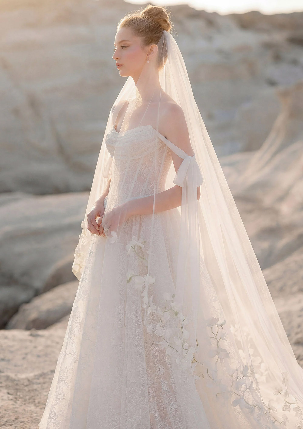 Model wearing a white bridal gown